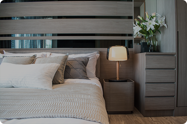 Bedroom using a bedside table lamp