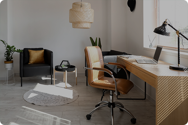 home office with table lamp and overhead lighting