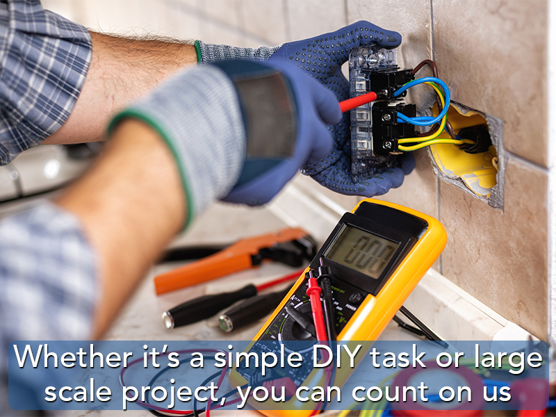 image of an electrical contractor at work